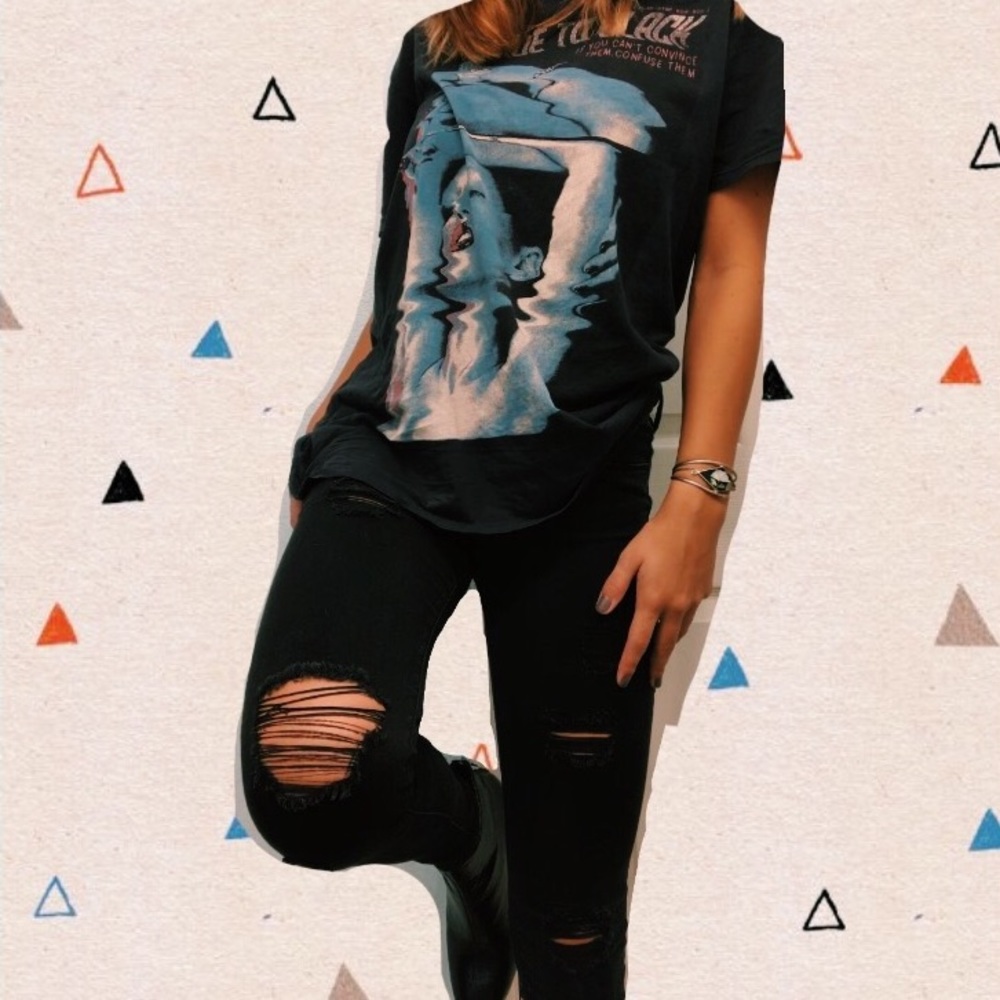 Distressed black jeggings